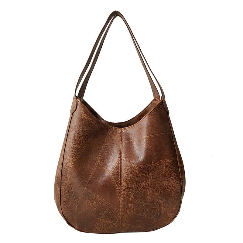 Vintage women's handbag by Spacewallart, stylish accessory with leather texture and classic design, suitable for everyday use.