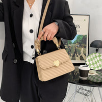 Spacewallart chain shoulder bag accessory with a stylish design featuring a metal chain strap and compact shape.