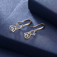 Sterling silver cat-shaped zircon earrings with detailed design, perfect accessories for animal lovers and jewelry enthusiasts.
