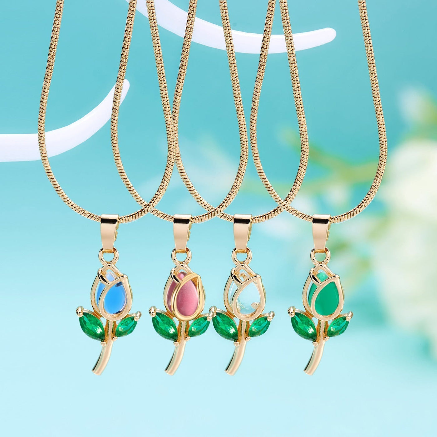 Elegant tulip-shaped necklace from Spacewallart, showcasing a delicate floral pendant on a sleek chain.