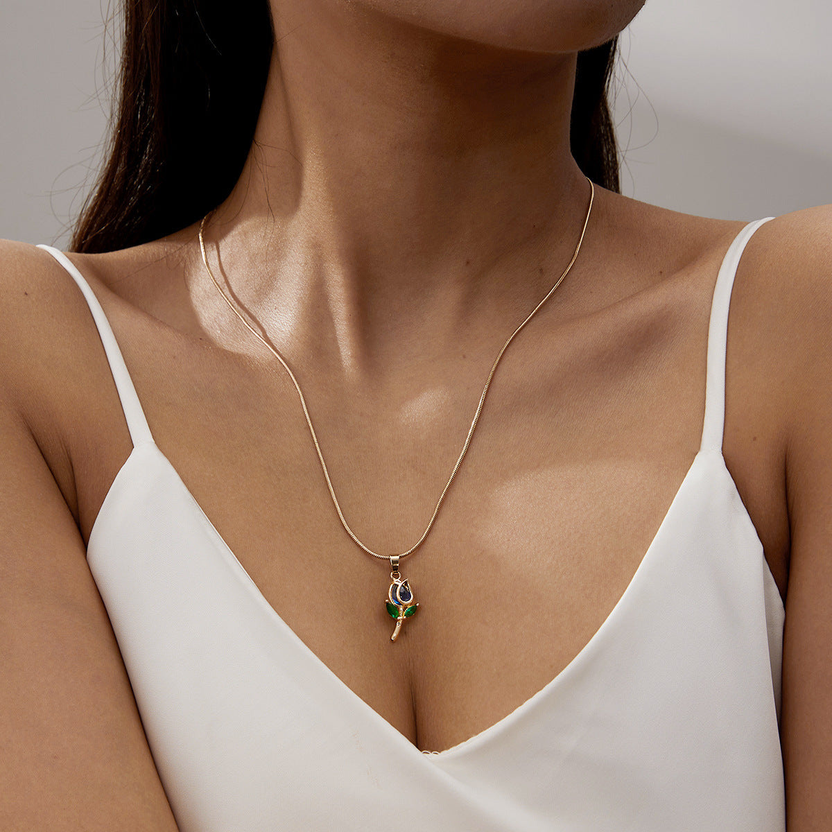 Elegant Tulip Necklace from Spacewallart, showcasing a delicate floral accessory with a tulip pendant on a fine chain.