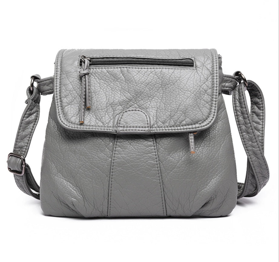 Spacewallart Crossbody Soft PU Leather Shoulder Bag, accessories, showing its sleek design and adjustable strap.
