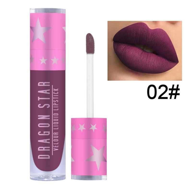 Matte velvet purple lipstick from Spacewallart, showcasing a smooth, rich purple shade in a sleek beauty product container.