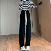 Makaron knitted wide-leg pants in beige from Spacewallart, displayed on a model showcasing relaxed fit and stylish design.