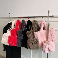 Chain plush handbag by Spacewallart featuring a soft, colorful plush exterior and a metal chain strap, accessory for stylish outfits.