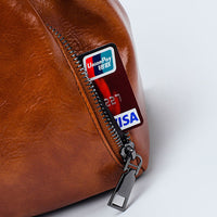 Vintage Oil Wax leather luxury handbag by Spacewallart featuring a classic design and rich leather texture.