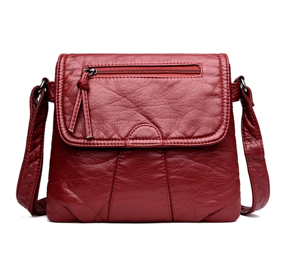 Spacewallart crossbody soft PU leather shoulder bag with adjustable strap and compact design, perfect for accessories and daily use.
