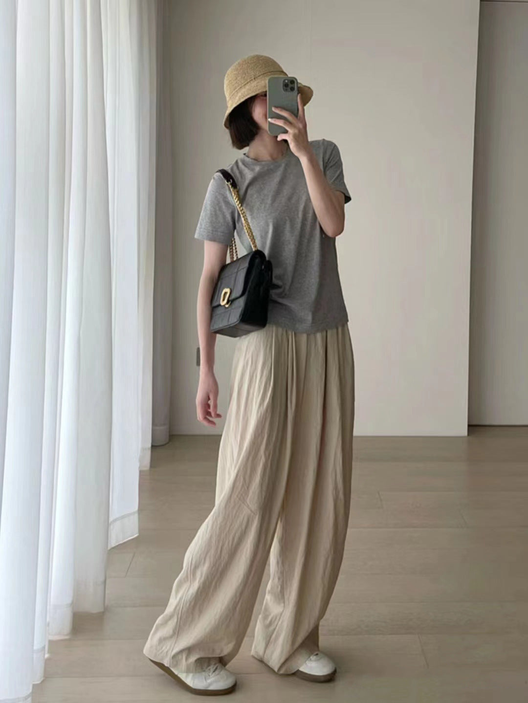 Spacewallart wide-leg pants with a tight waist, loose fit, and flowing fabric, styled as casual apparel for comfort and style.
