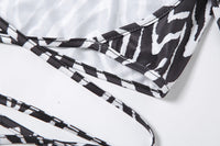 Spacewallart striped print lace-up short top with sleeveless design and bold pattern, perfect for casual summer outfits.