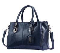 Vintage oil wax leather luxury handbag by Spacewallart, showcasing a textured, stylish accessory with elegant craftsmanship.