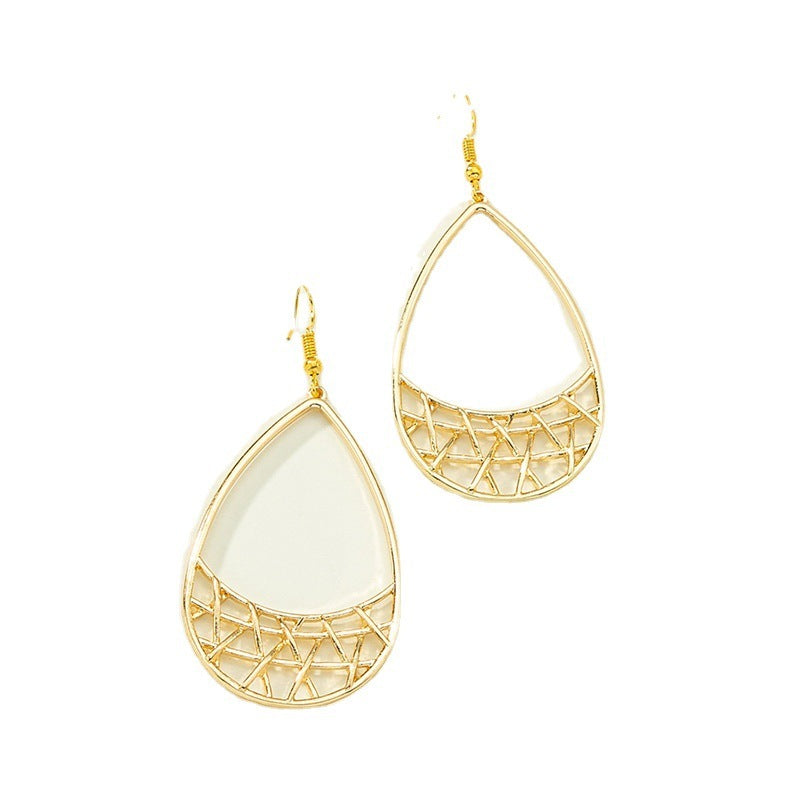 Simple geometric earrings by Spacewallart featuring sleek, modern shapes perfect for stylish accessories or everyday wear.