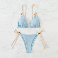Solid color strap bikini swimsuits by Spacewallart, featuring two stylish swimwear pieces with adjustable straps and vibrant hues.