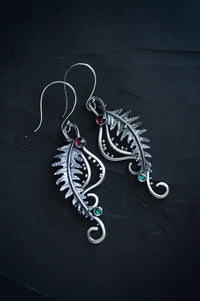 Silver tail-shaped earrings from Spacewallart, stylish accessories with a sleek, modern design for everyday wear.
