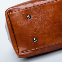 Vintage oil wax leather luxury handbag from Spacewallart, showcasing high-quality leather and elegant accessory design.