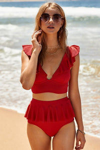 Spacewallart ruffled swimwear apparel with stylish ruffle details, perfect for beach or poolside fashion.