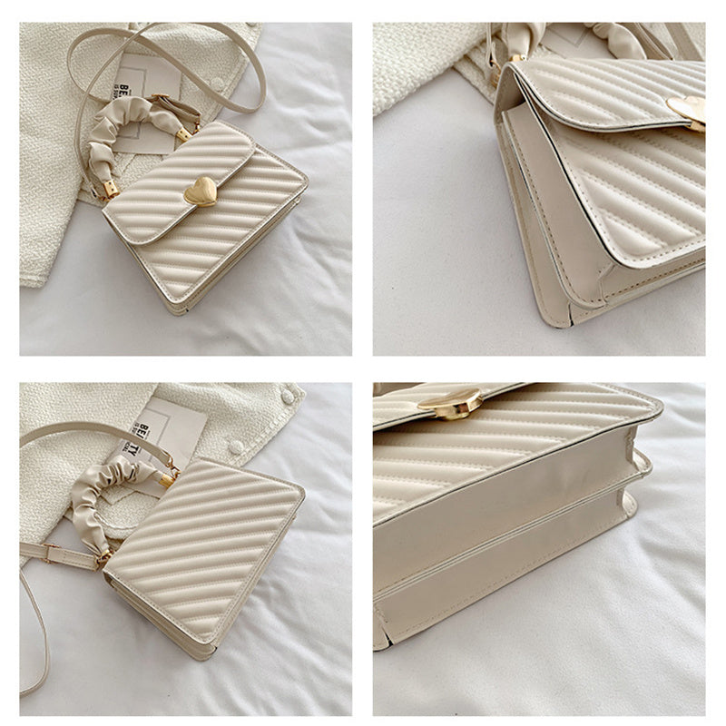 Spacewallart chain shoulder bag showcasing a stylish accessory with a chain strap and sleek design.