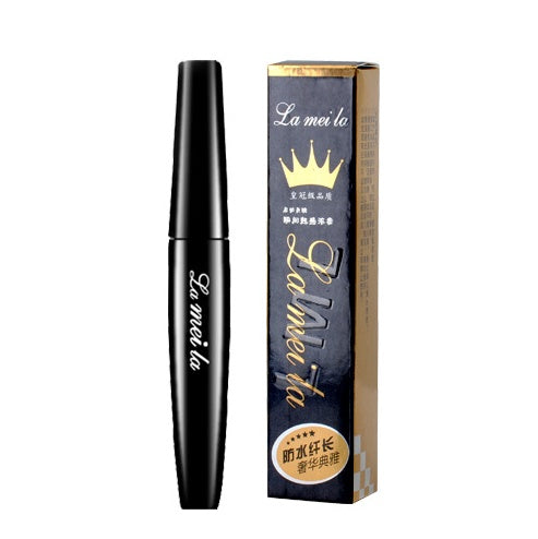 Close-up of Spacewallart Thick Waterproof Mascara wand with coated lashes, showcasing its bold, volumizing formula for beauty enhancement.