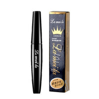 Close-up of Spacewallart Thick Waterproof Mascara wand with coated lashes, showcasing its bold, volumizing formula for beauty enhancement.