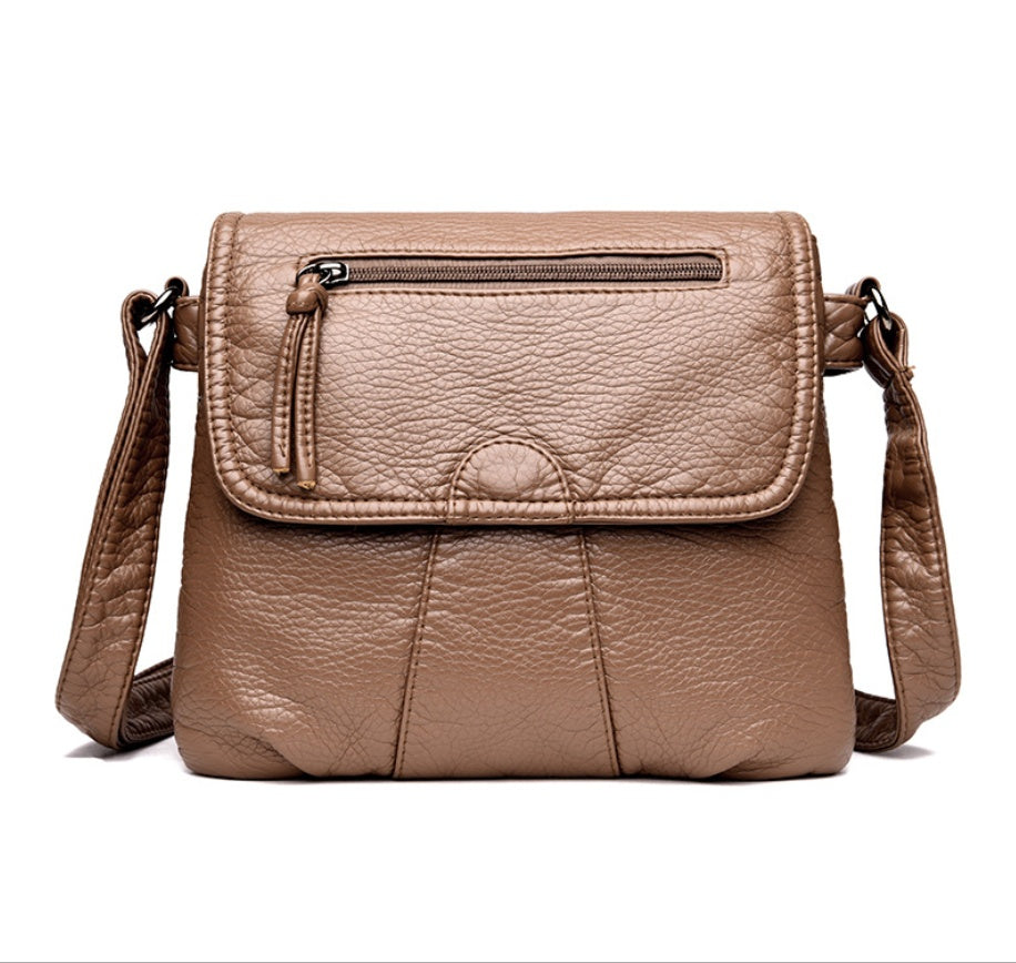 Spacewallart crossbody shoulder bag made of soft PU leather, compact accessories with adjustable strap and sleek design.