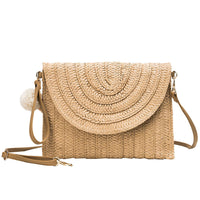 Hand woven bag from Spacewallart featuring natural fibers and intricate craftsmanship, perfect for stylish accessories.