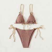 Solid color strap bikini swimsuit from Spacewallart, featuring a stylish two-piece design with adjustable straps in vibrant shades.
