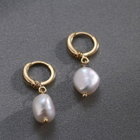 Spacewallart women's earrings, stylish accessory jewelry with gold-tone hoops and dangling design, perfect for everyday wear.