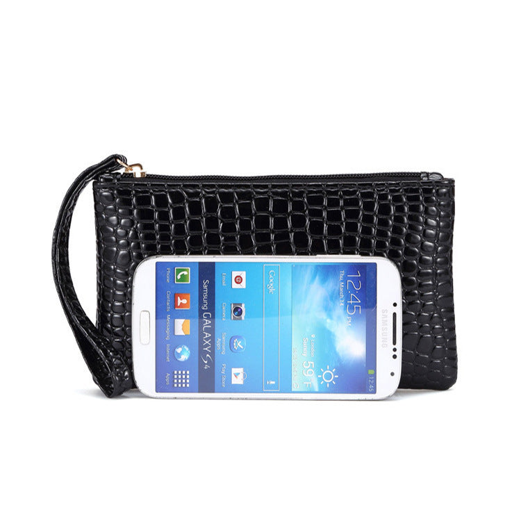Small mobile phone bag accessory by Spacewallart, featuring a compact design with adjustable strap and stylish appearance.