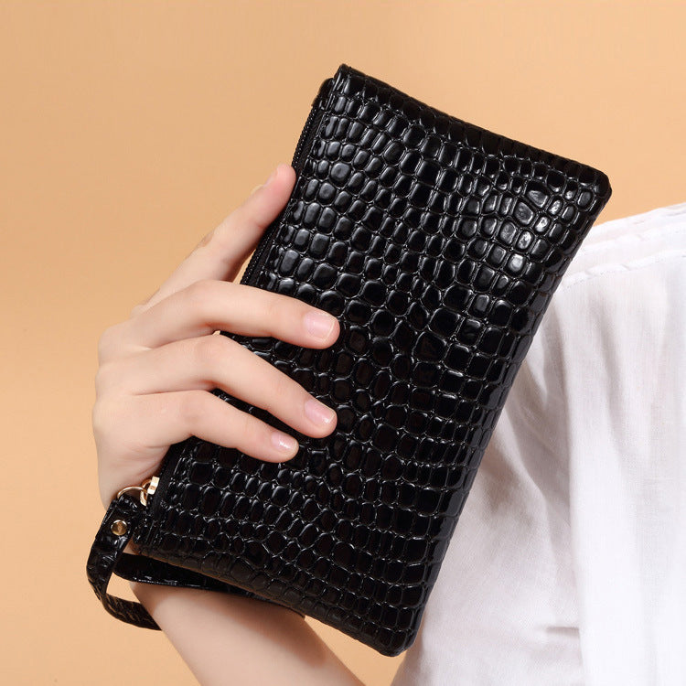 Small mobile phone bag accessory by Spacewallart featuring a compact design with a zipper closure and stylish strap.