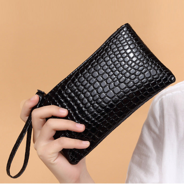 Small Spacewallart mobile phone bag accessory with adjustable strap and compact design, suitable for carrying smartphones securely.