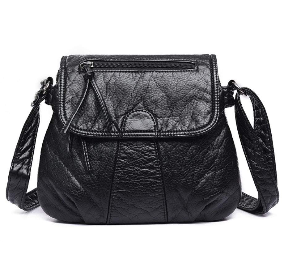 Spacewallart Crossbody Soft PU Leather Shoulder Bag showing sleek design and adjustable strap on a plain background.