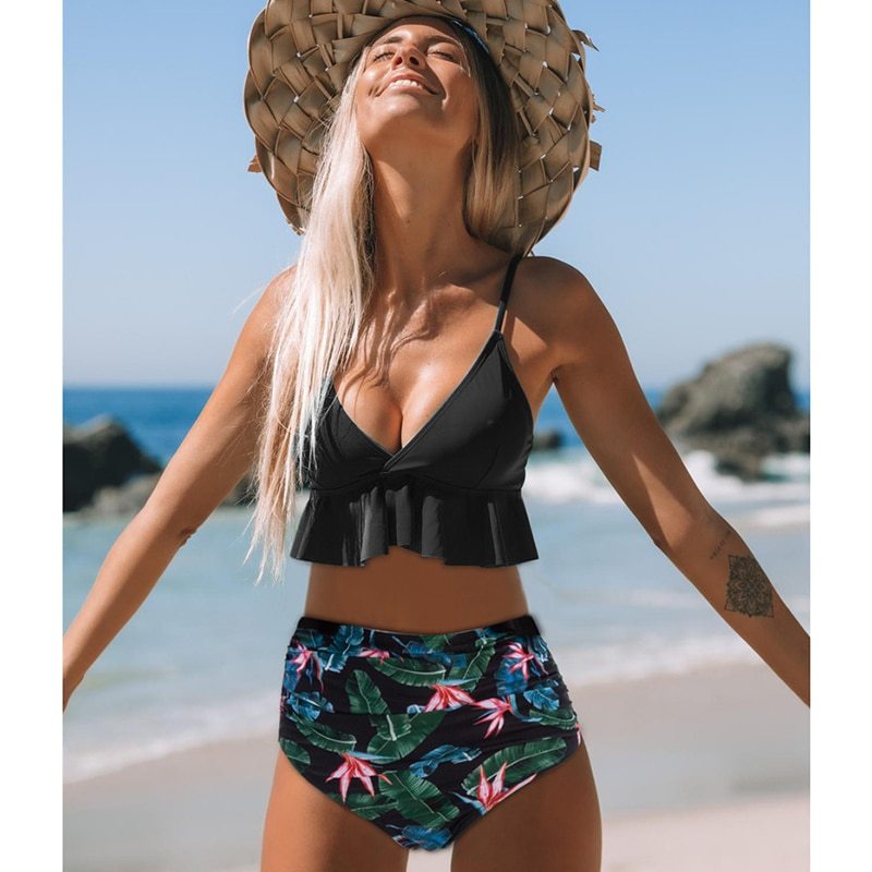 Ruffled swimwear by Spacewallart featuring a stylish, feminine design with ruffled details on the swimsuit.