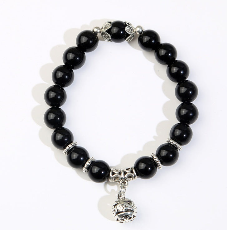 Natural opal beads bracelet featuring multicolored, polished opal stones, stylishly strung as a jewelry accessory.