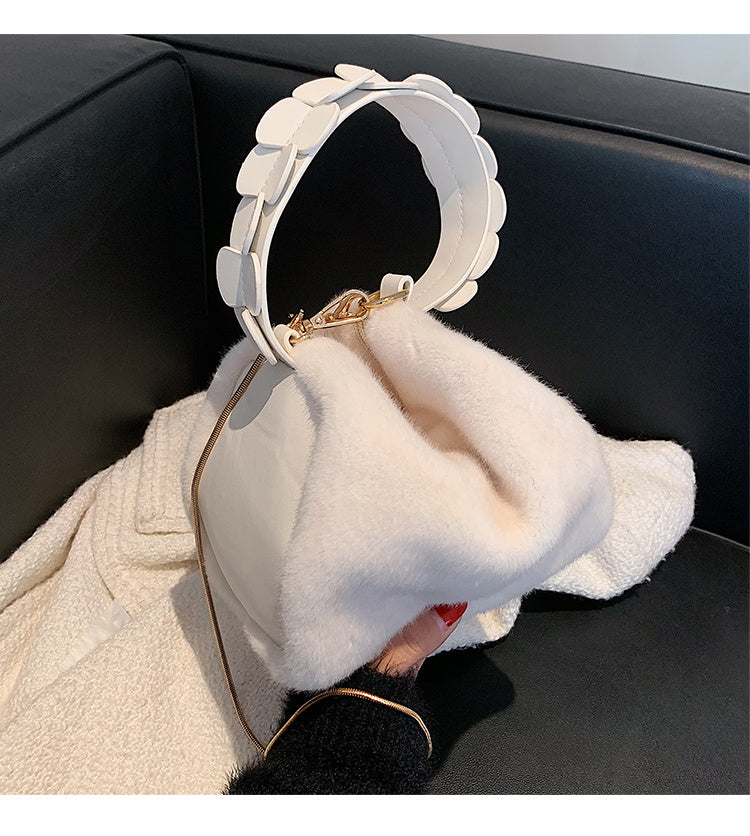 Small furry crossbody hand bag by Spacewallart featuring soft, plush material and a compact design for stylish accessories.
