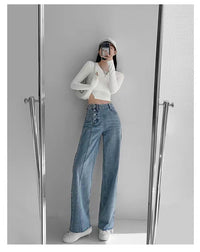 Spacewallart irregular breasted high waist jeans, denim apparel with unique design, featuring a high waist and distressed details.