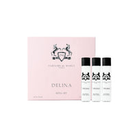 Parfums de Marly Delina floral parfum for women, featuring rose notes in a 75ml bottle, displayed with a decorative background