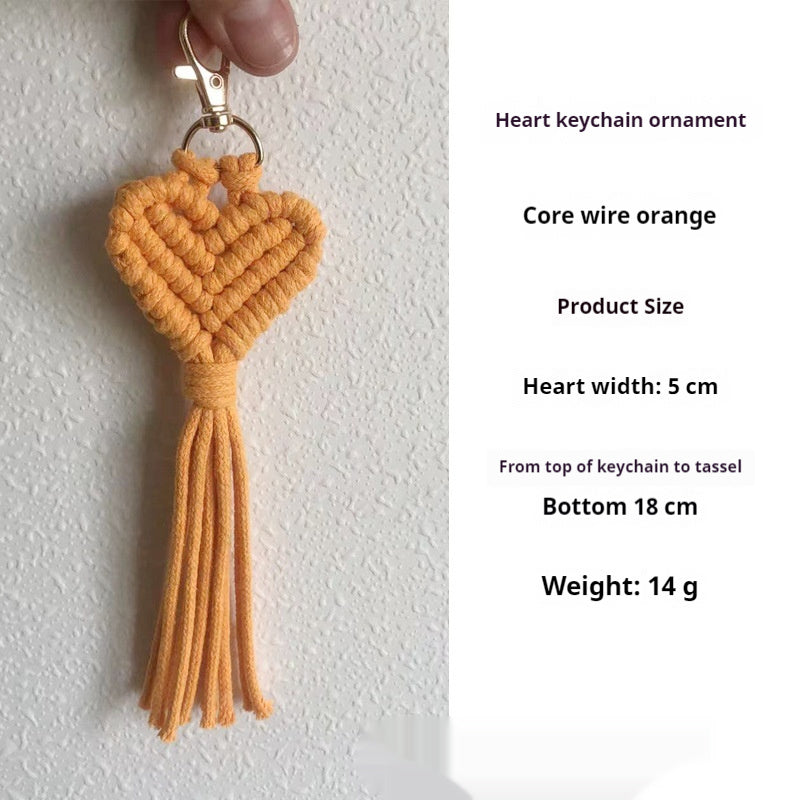 Hand-woven key accessory by Spacewallart, small creative gift, featuring colorful woven design on a keychain or keyring.