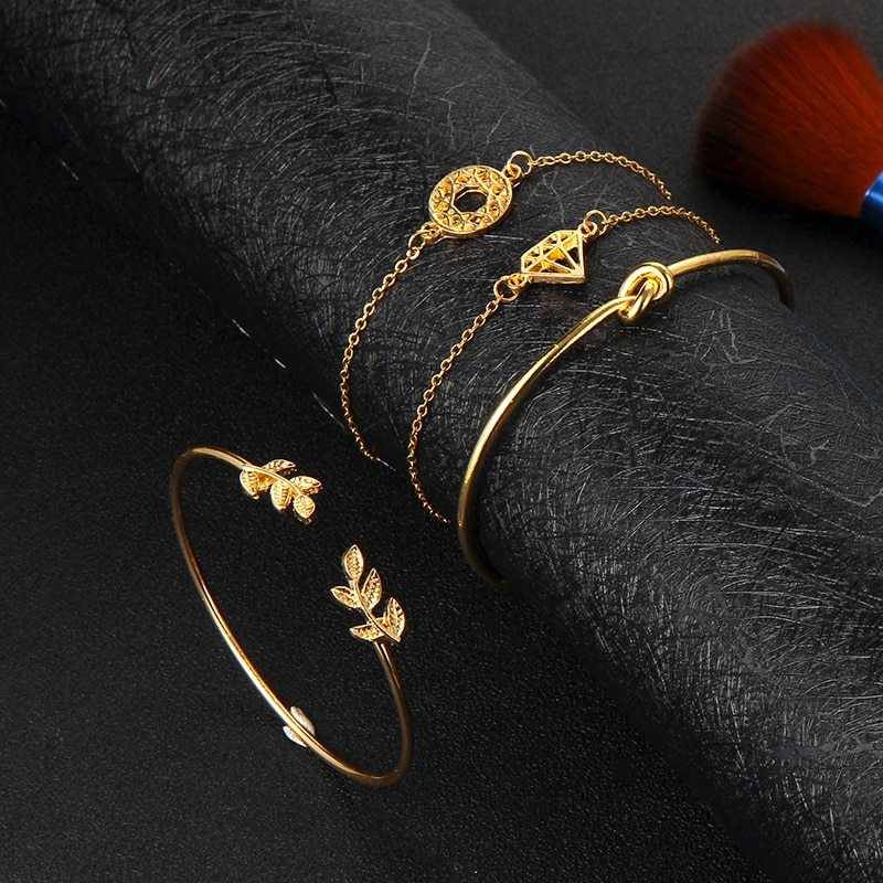 Bohemia leaf knot hand cuff link chain charm bracelet with intricate leaf and knot design, stylish accessory by Spacewallart