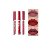 Close-up of Spacewallart Matte Non-stick Cup Lip Gloss in a sleek container with a smooth, matte finish and applicator wand visible.