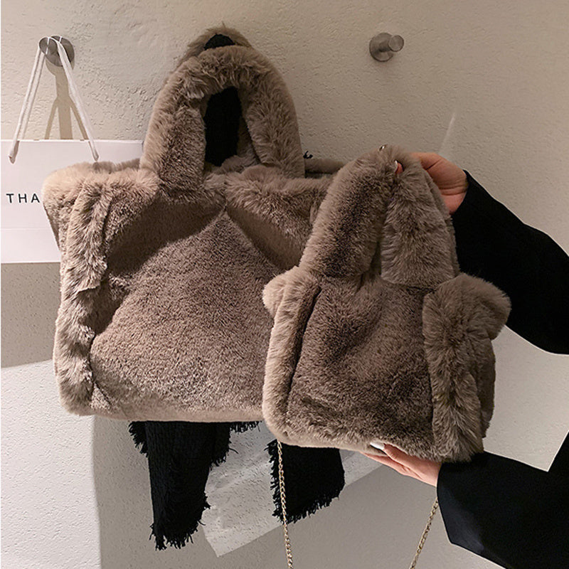 Spacewallart Chain Plush Handbag with a decorative chain strap, soft plush material, and stylish accessory design.