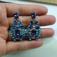 Spacewallart alloy diamond earrings, elegant accessory with sparkling diamond design, close-up of earrings on a neutral background.