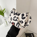 Korean street trend hand-carried bag from Spacewallart, stylish accessories with vibrant design and compact size.