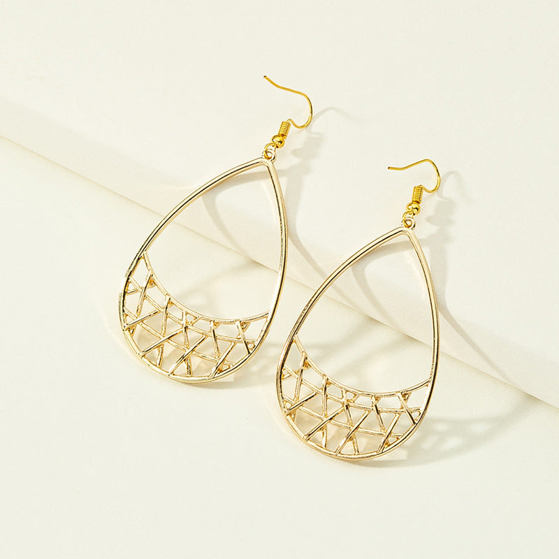 Simple geometric earrings by Spacewallart featuring sleek metal designs, perfect for modern accessories and everyday wear.