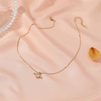 Heart Wings Necklace by Spacewallart featuring a delicate pendant with heart and wing design in silver tone jewelry.