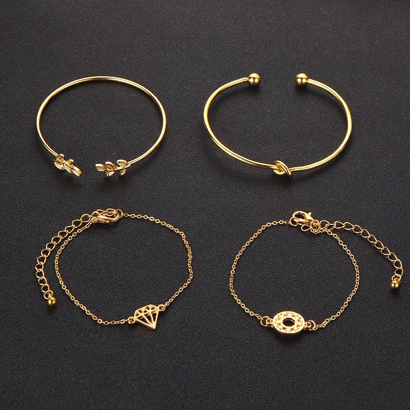 Bohemia Leaf Knot hand cuff link chain charm bracelet by Spacewallart with leaf and knot design, stylish accessory for women.