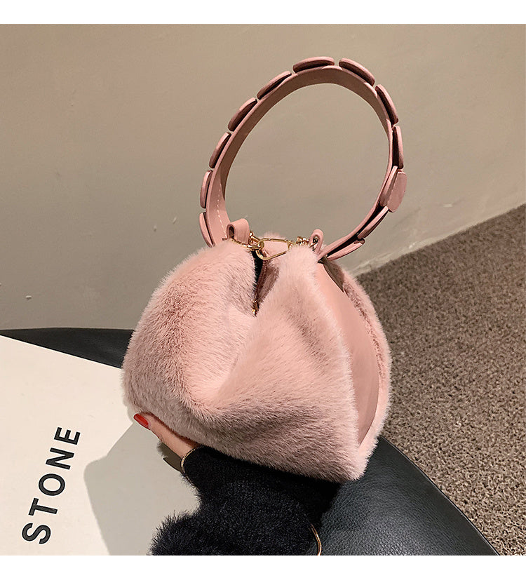 Small furry crossbody handbag by Spacewallart, featuring soft plush texture and compact design for stylish accessorizing.
