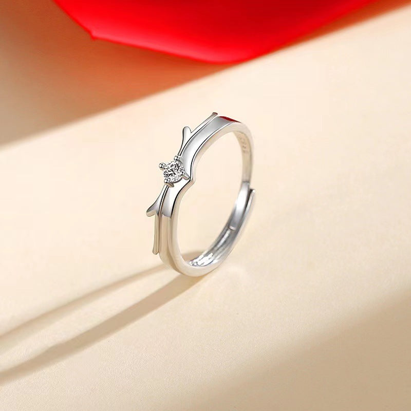Pair of flying couple rings from Spacewallart, silver-toned accessories with intricate wing details, suitable for couples or fashion accents.