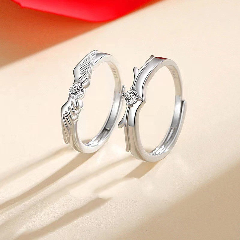 Flying Couple Rings by Spacewallart, elegant silver accessories featuring intertwined flying couple design on smooth band