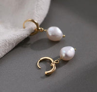 Spacewallart women's earrings, stylish accessory jewelry featuring elegant design with silver-tone finish and intricate detailing.