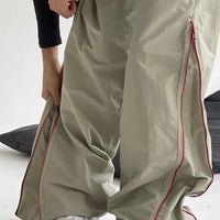 Spacewallart women's loose matching trousers, relaxed-fit casual apparel with an elastic waistband and stylish design.