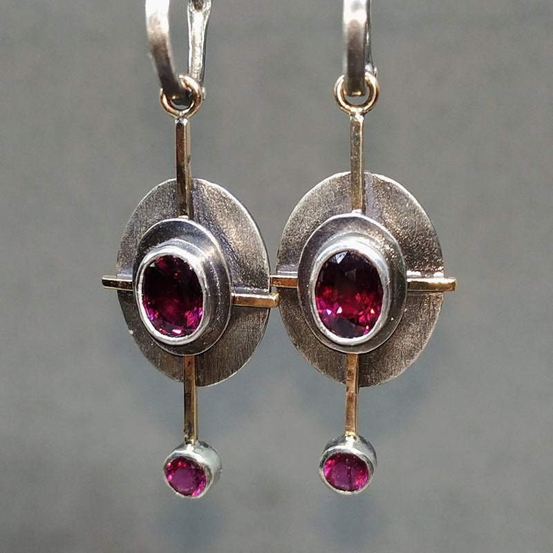 Retro oval earrings by Spacewallart featuring vintage-inspired design and a polished finish, perfect for accessories.